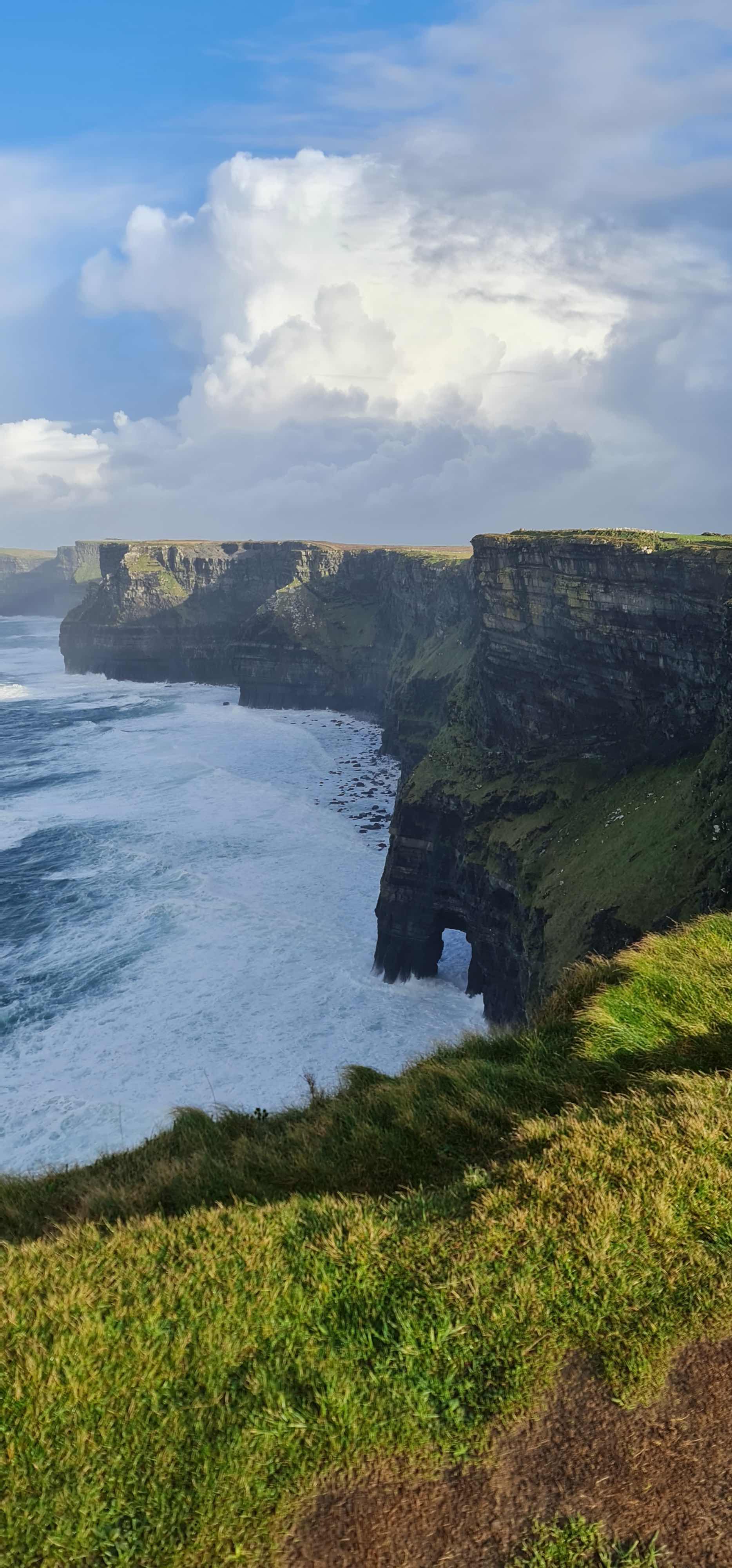 a tall cliff over the sea